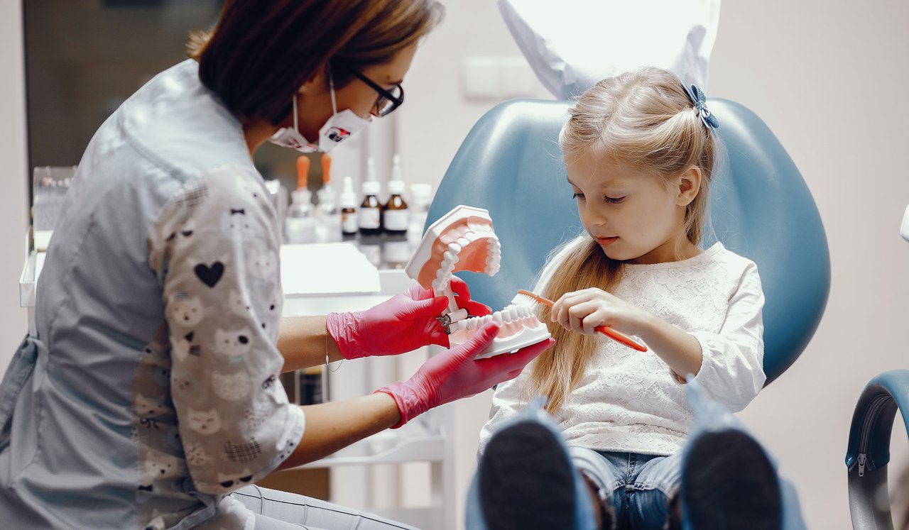 Smiling child during a dental checkup at Kids 360 Pediatric Dentistry, trusted pediatric dentist in Richmond