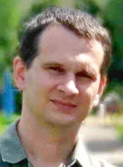 Преподаватель по физике Евгений Александрович Гнеушев