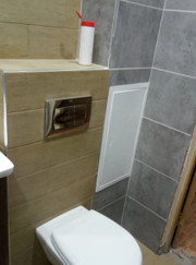 Мастер по обшивке стен, каменщик Александр Александрович Байбаков